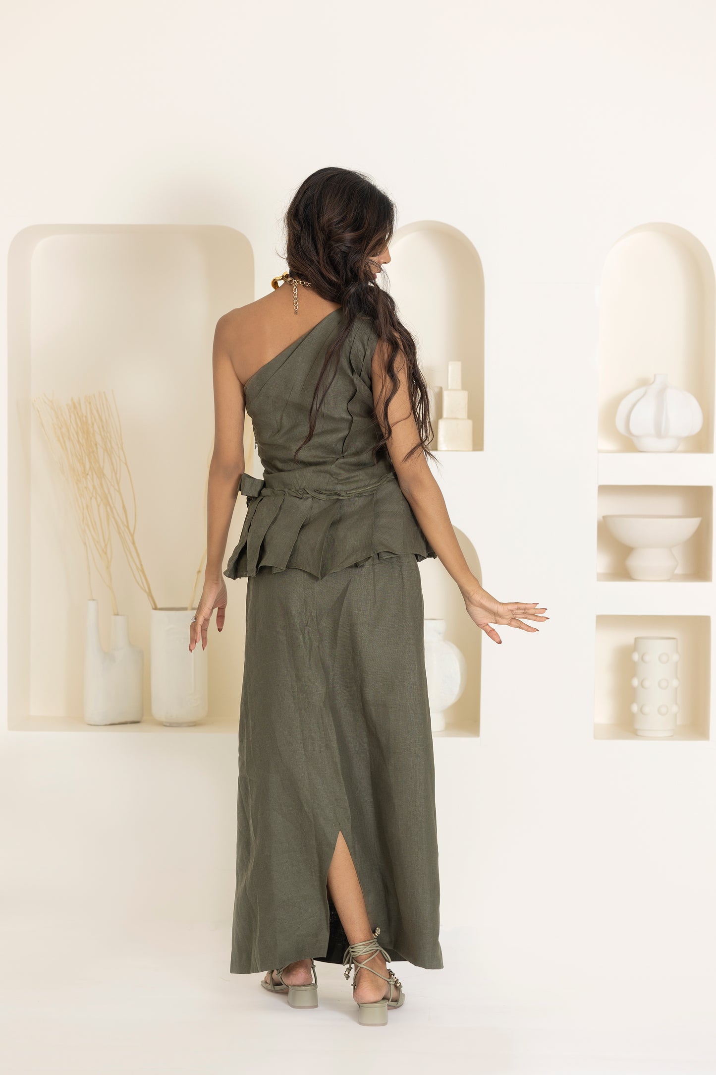 green peplum top and skirt