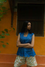 Sleeveless Blue Blouse and Printed Shorts
