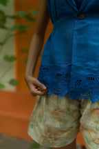 Sleeveless Blue Blouse and Printed Shorts