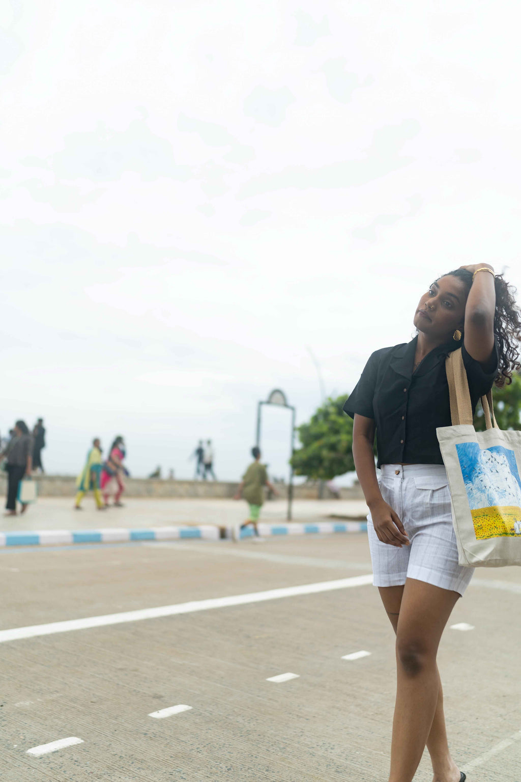 Button -down Black shirt and White Shorts